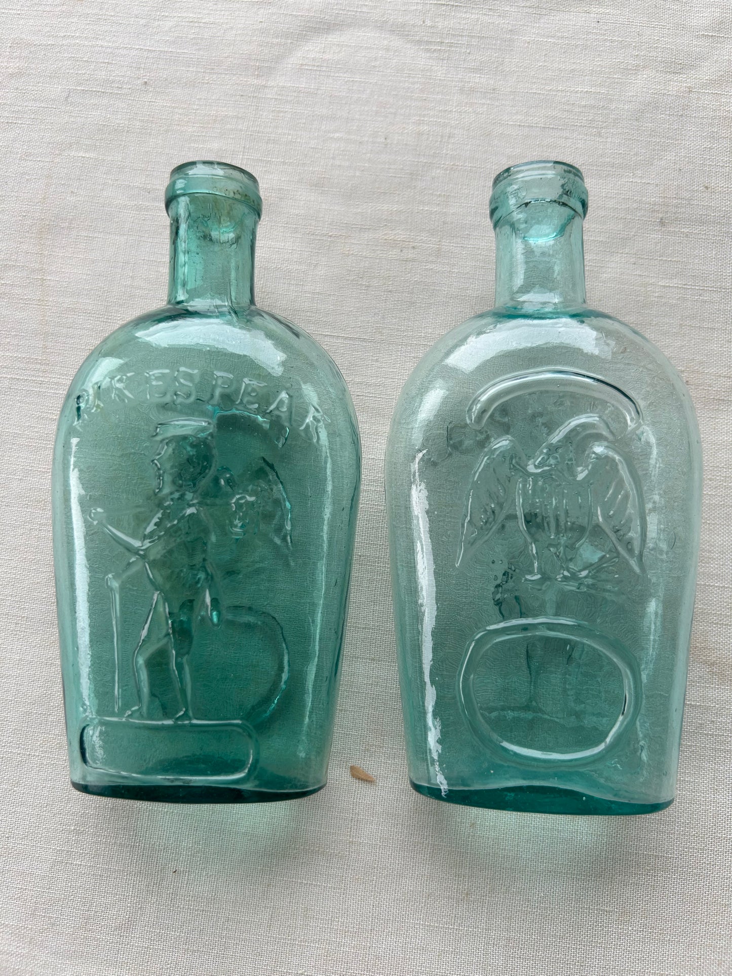 Historical Pikes Peak Whiskey Flasks